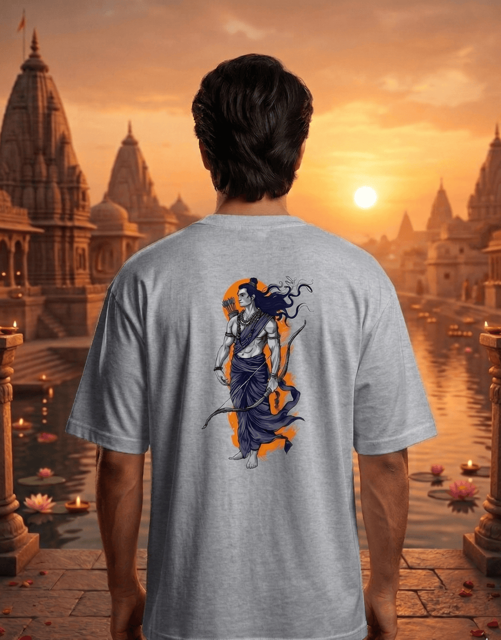 Person wearing a t-shirt with a graphic design of a warrior on a scenic temple background