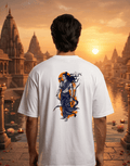 Person wearing a t-shirt with a graphic design of a warrior on a scenic temple background