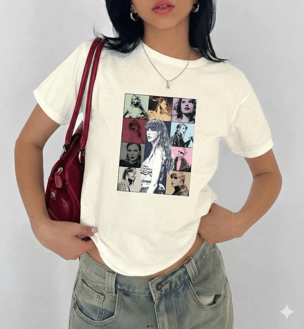 Person wearing a taylor swift off white t-shirt with graphic design and holding a red handbag.